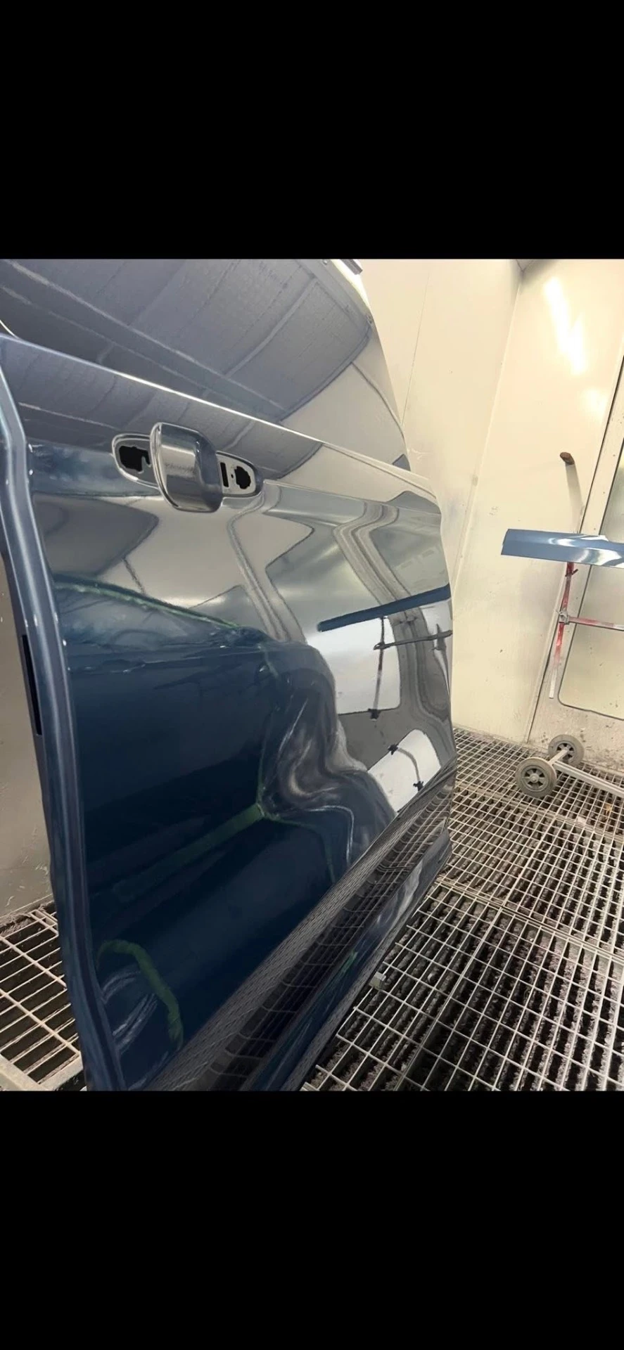 Ford Transit Custom loading door paint finish and handle opening on a stand