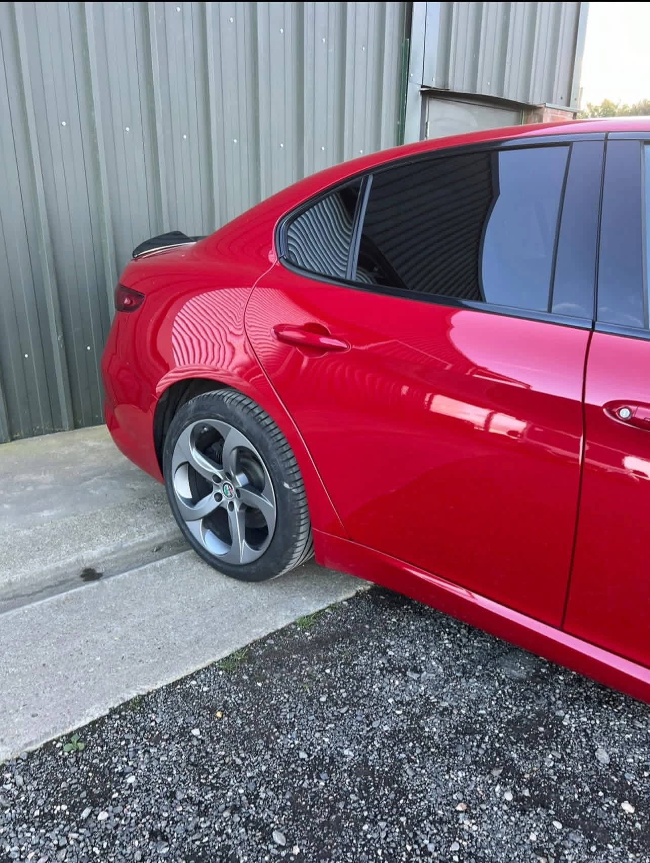 Alfa Romeo Giulia finished offside rear quarter paintwork, side view at JB Bodyworks