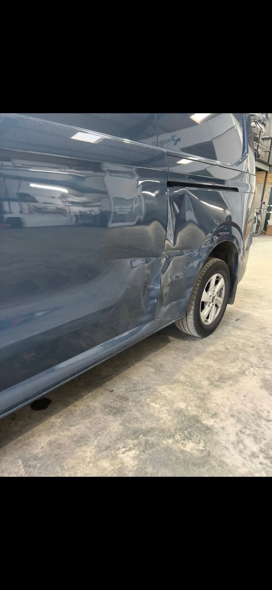 Ford Transit Custom damaged loading door and rear quarter panel before repair