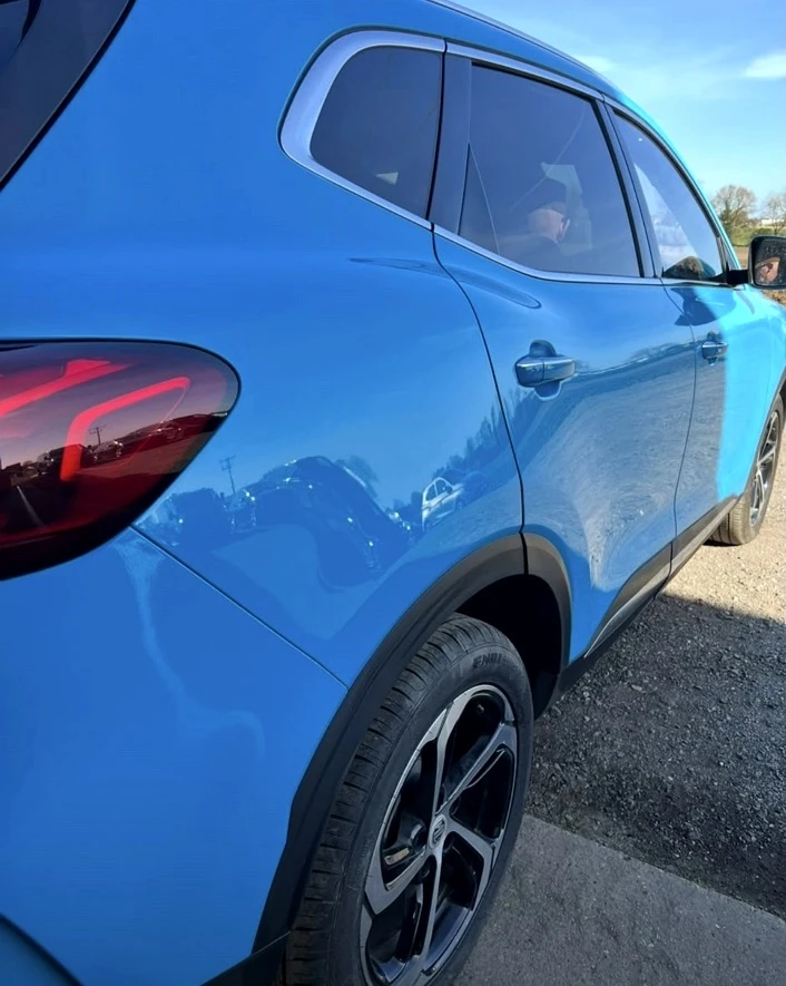 Blue SUV rear door and wheel arch after body repair at JB Bodyworks