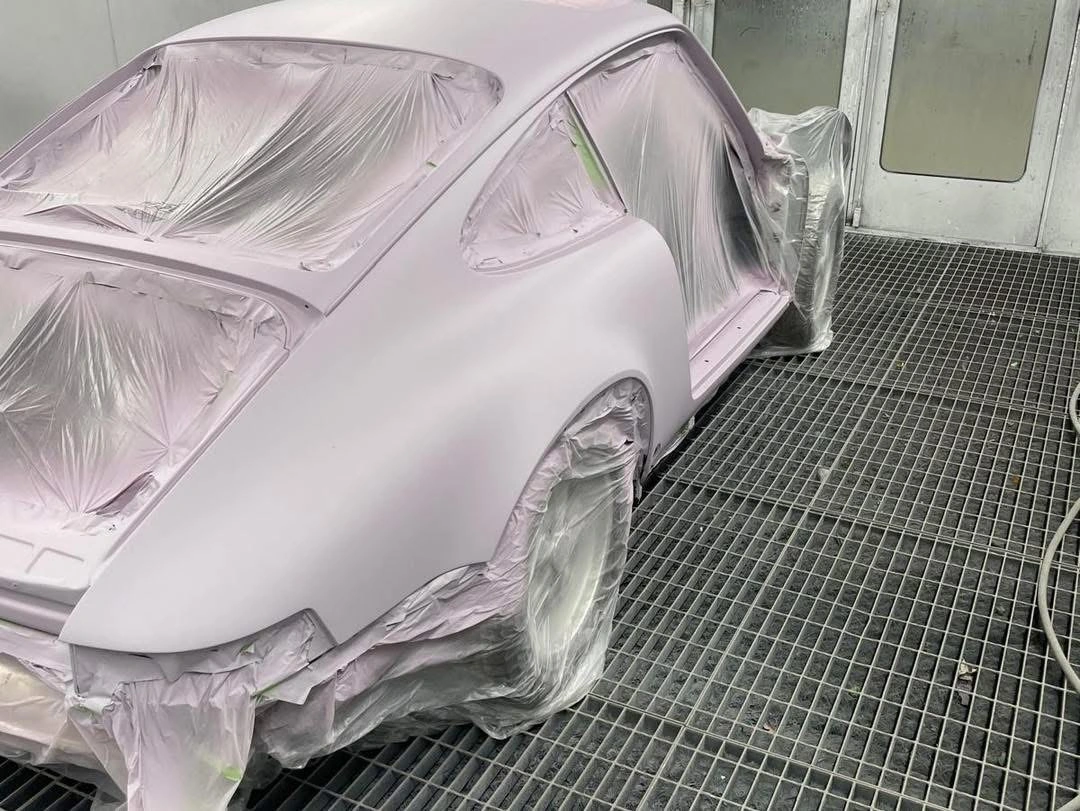 Porsche 911 masked bodywork in preparation coat from the opposite rear angle